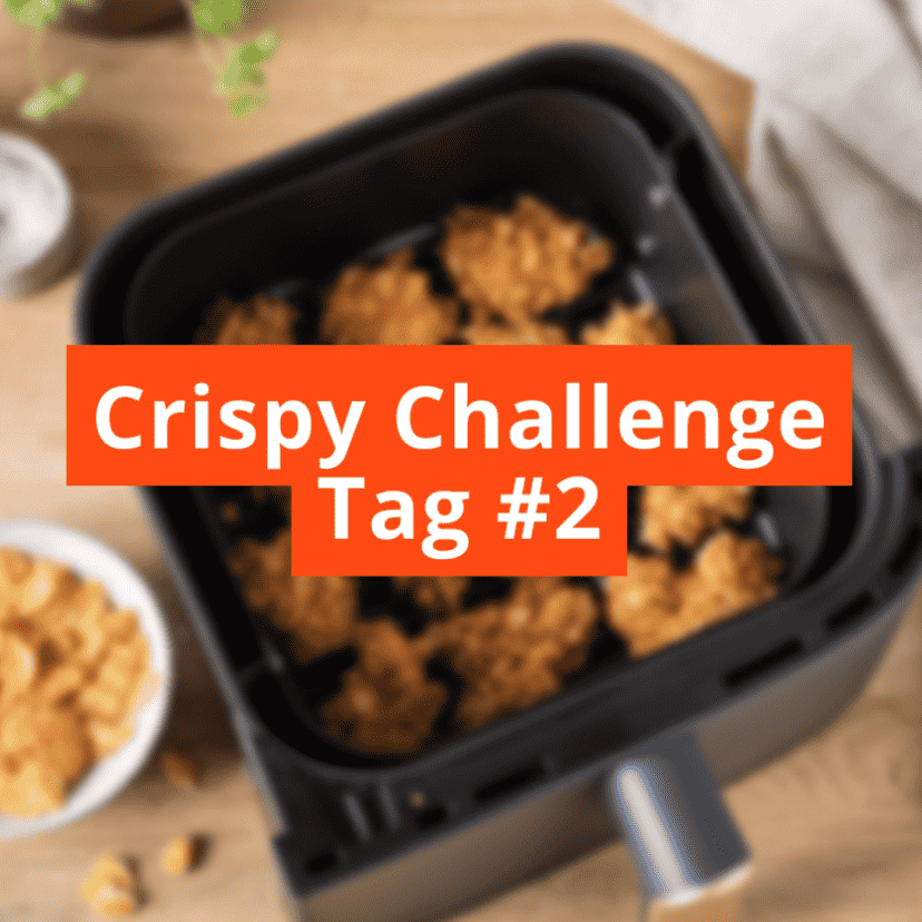 Airfryer Korb in unschärfe mit Crispy Challange Schriftzug