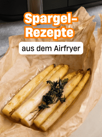 Spargel mit Butter auf einem Teller vor einem Airfryer